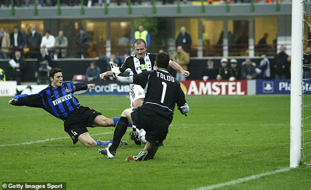 Alan Shearer scores one of his two goals against the Serie A side in a 2-2 draw in March 2003