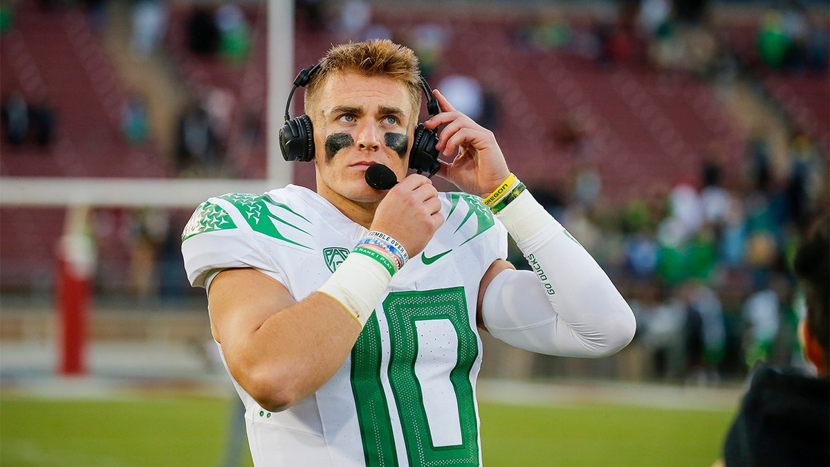 Bo Nix conducts an interview